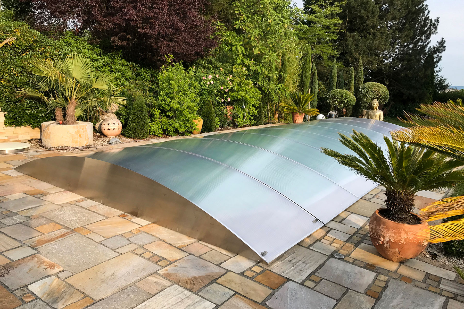 FlexiRoof pool enclosures, covers are slim, no rail system necessary, simple and completely removable